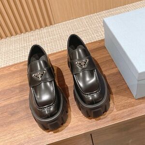 Prada Women's Black Glossy Loafers